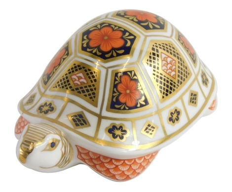 A Royal Crown Derby paperweight ornament tortoise, printed marks beneath, silver gilt stopper, 6cm high.