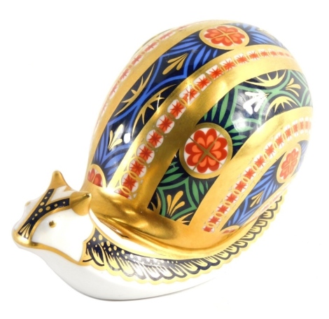 A Royal Crown Derby paperweight ornament, Garden Snail limited edition 2669/4500, gilt stopper, 8cm high.