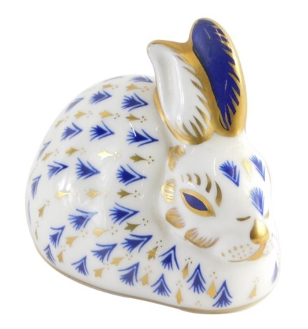 A Royal Crown Derby paperweight ornament rabbit, printed marks beneath, silver gilt stopped, 8cm high.