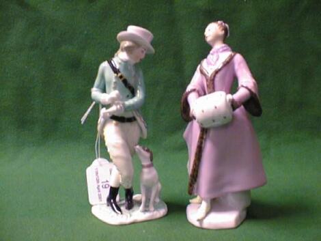 A pair of 20th C Vienna porcelain Figures of a gentleman with hound and