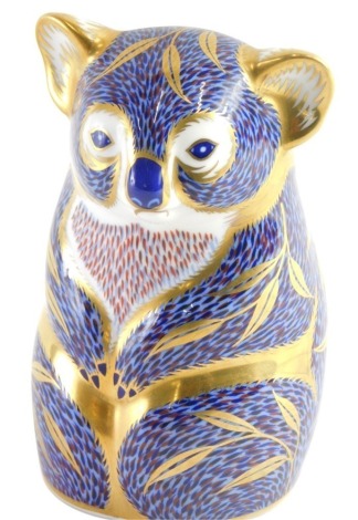 A Royal Crown Derby paperweight ornament koala, printed marks beneath, gilt stopper, 12cm high.