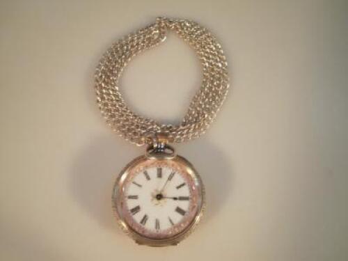 A ladies silver fob watch with pink enamel embellished dial and engraving overall