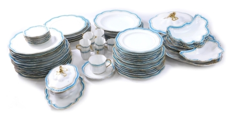 A late 19thC Limoges A. Lanternier dinner service, to include large serving dish, 43cm wide, crescent shaped dishes, lidded tureen, sauce tureen, bowls, plates, side plates, etc., part settings for seven, each piece with gilt highlights and blue line deco