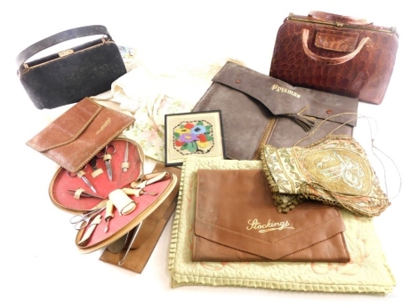 A vintage alligator finish hand bag, with gilt metal label and The Martin Label, and a quantity of various table linen, some worked. (a quantity)