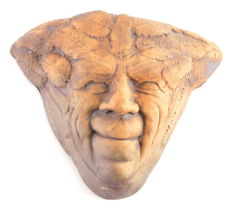 An Andrew Bull style Studio pottery face mask, Greenman type, 23cm high, unmarked.