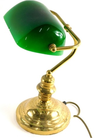 A 1930s style brass desk lamp, with articulated green shade, and modern electric feature, 40cm high.