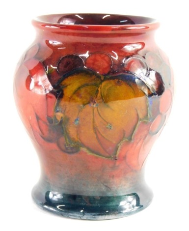 An early 20thC Moorcroft flambe Leaf and Berry pattern vase, of bellied circular form, impressed marks beneath, 9cm high.